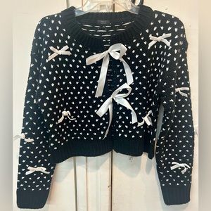 DEBUT  sweater in size ML color black black and white